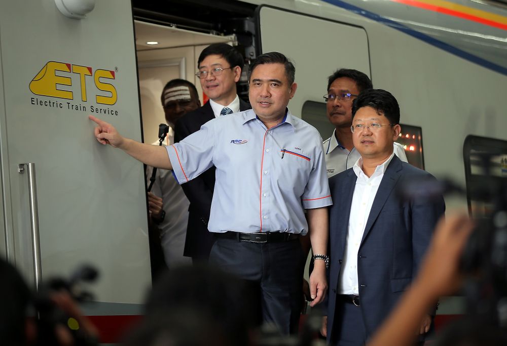 Chinese ambassador to Malaysia Bai Tian (right) visits the China Railway Rolling Stock Corp (CRRC) rolling stock centre with Transport Minister Anthony Loke in Batu Gajah January 3, 2019. u00e2u20acu2022 Picture by Farhan Najib