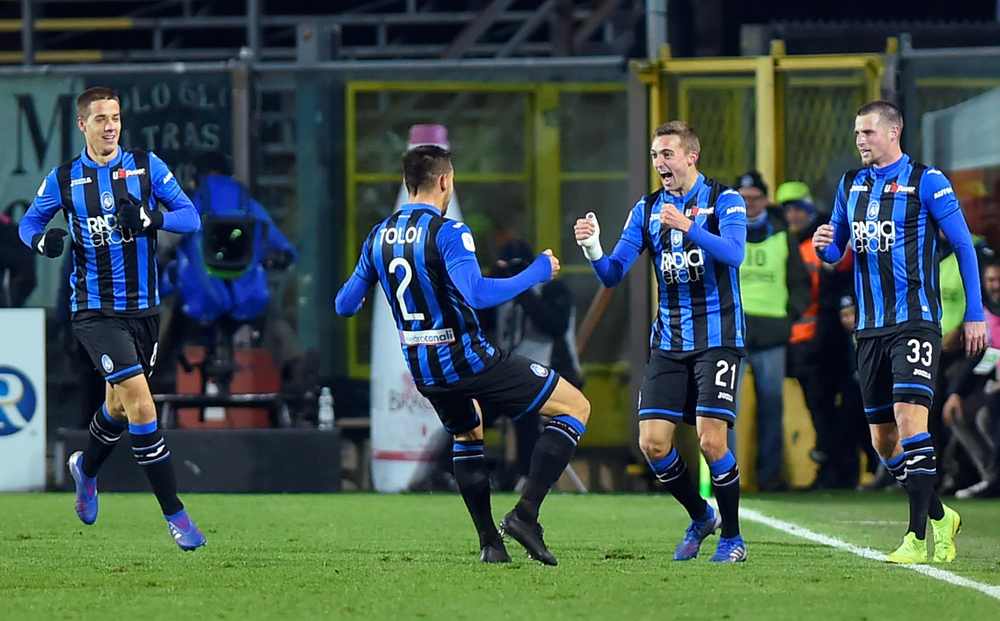 Atalanta's Timothy Castagne (second right) celebrates scoring their first goal with Rafael Toloi in the Coppa Italia quarterfinal against Juventus at Stadio Atleti Azzurri, Bergamo January 30, 2019. u00e2u20acu201d Reuters pic