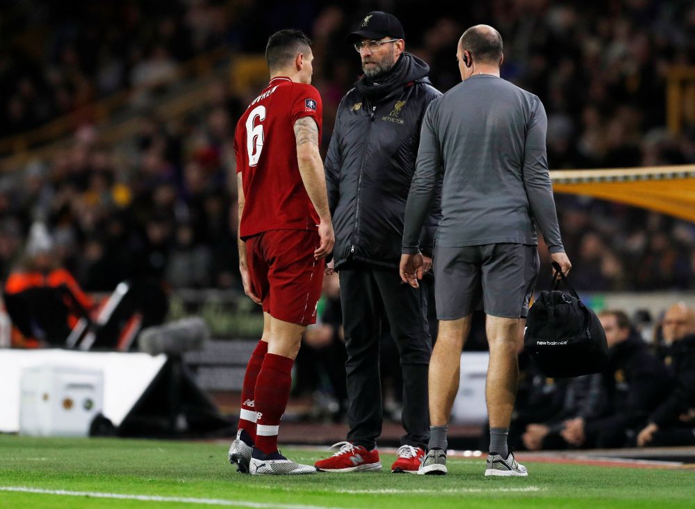 Liverpool's Dejan Lovren speaks with Liverpool manager Juergen Klopp as he is substituted off, January 7, 2019. u00e2u20acu2022 Reuters pic