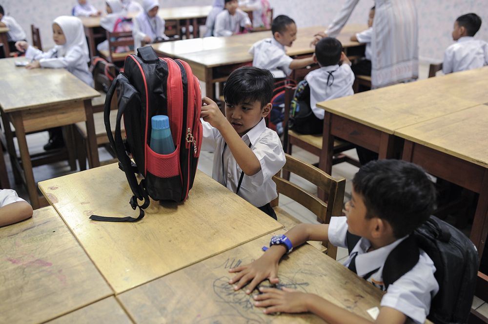 Students attend the first day of school at Sekolah Kebangsaan Putrajaya Persint 14 (1) January 2, 2019. u00e2u20acu2022 Picture by Shafwan Zaidon