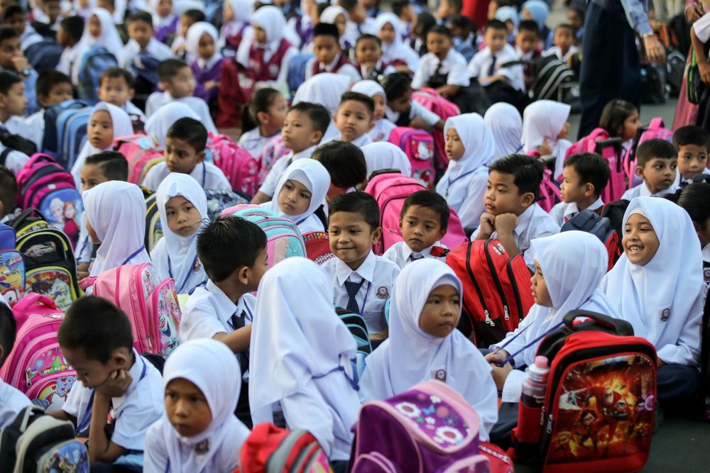 Students attend the first day of school at Sekolah Kebangsaan Silibin in Ipoh January 2, 2019. u00e2u20acu2022 Picture by Farhan Najib
