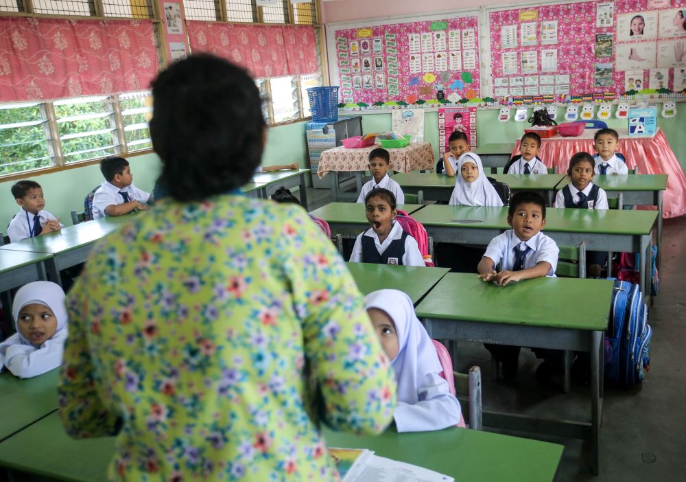 Students attend the first day of school at Sekolah Kebangsaan Silibin in Ipoh January 2, 2019. u00e2u20acu2022 Picture by Farhan Najib