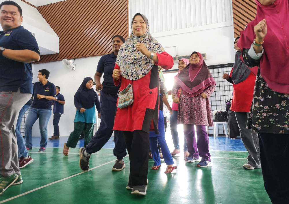 Zaliha says the 50Keluarga Sihat programme has shown her that the benefits of exercising and living a healthier lifestyle. u00e2u20acu201d Pictures by Shafwan Zaidon
