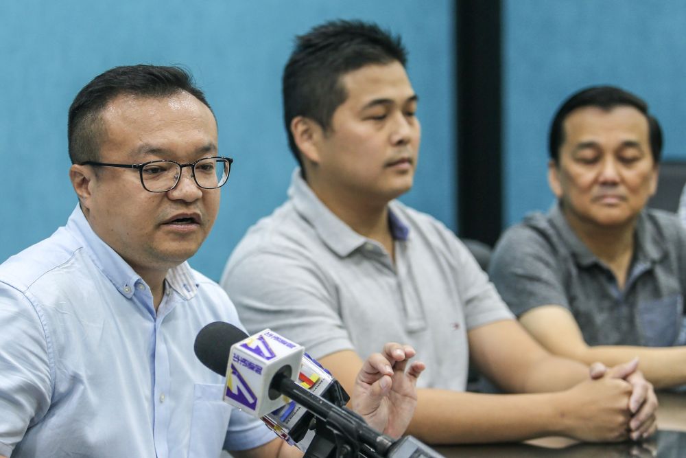 Lim Lip Eng's political secretary Yew Jia Haur (left) speaks during the press conference at the DAP office in Kepong January 9, 2019. u00e2u20acu2022  Picture by Hari Anggara