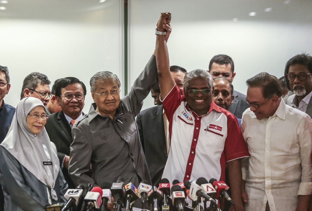 Tun Dr Mahathir Mohamad and Cameron Highlands candidate from DAP M. Manogaran during a press conference at Yayasan Al Bukhary in Kuala Lumpur January 4, 2019. ― Picture by Firdaus Latif