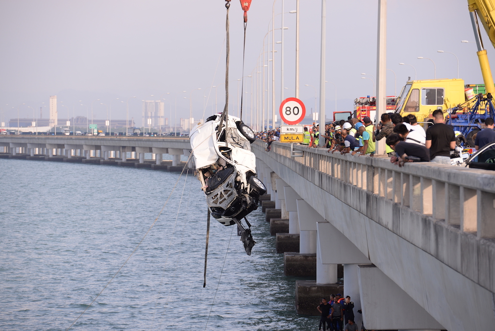 The Mazda CX5 SUV that plunged into the sea from the Penang Bridge on January 20, 2019, is recovered on January 22, 2019. u00e2u20acu201d Picture by KE Ooi
