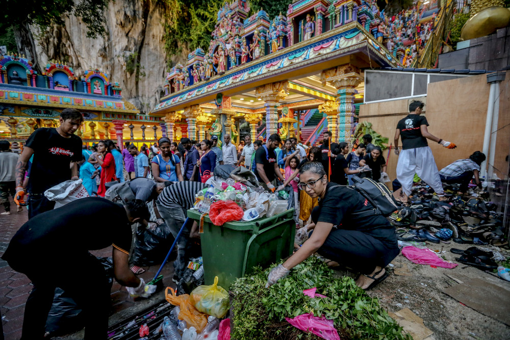 Overflowing bins were a common sight throughout the festivities at Batu Caves.