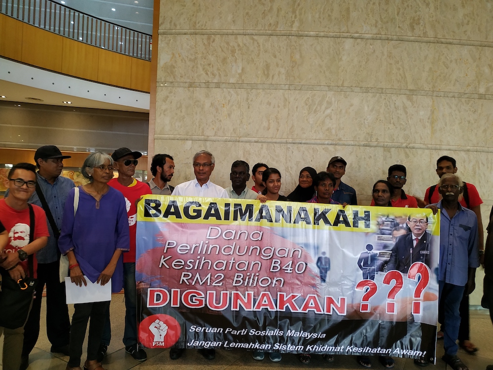 Socialist Party of Malaysia (PSM) protests against the mySalam health insurance scheme for the B40 at the Finance Ministry in Putrajaya January 24, 2019. u00e2u20acu201d Picture by Boo Su-Lyn