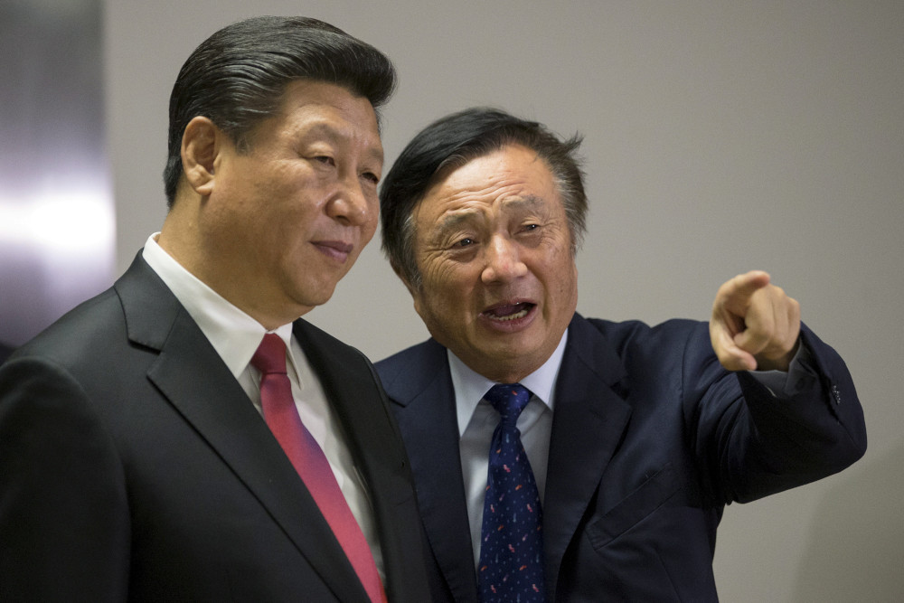 Chinese President Xi Jinping (left) pauses as he is shown around the offices of Huawei Technologies Co Ltd by Ren Zhengfei, president of Huawei, in London, Britain October 21, 2015. u00e2u20acu201d Reuters pic 