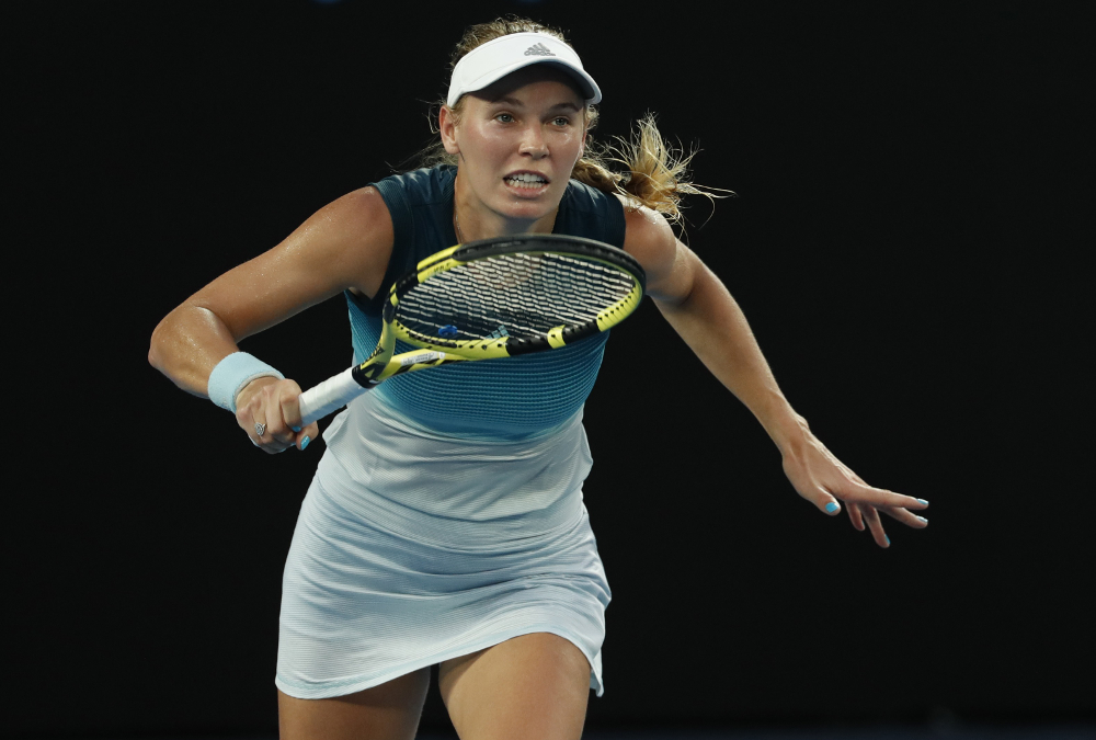 Denmarku00e2u20acu2122s Caroline Wozniacki in action during the match against Belgiumu00e2u20acu2122s Alison Van Uytvanck during the first round of Australian Open at the Rod Laver Arena, Melbourne January 14, 2019. u00e2u20acu201d Reuters pic