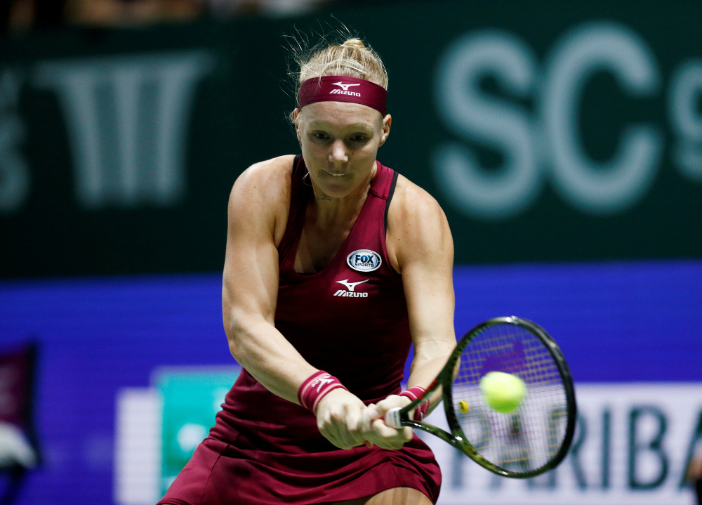 Netherlandsu00e2u20acu2122 Kiki Bertens in action during her WTA Tour Finals group stage match against Japanu00e2u20acu2122s Naomi Osaka at the Singapore Indoor Stadium, Singapore October 26, 2018. u00e2u20acu201d Reuters pic