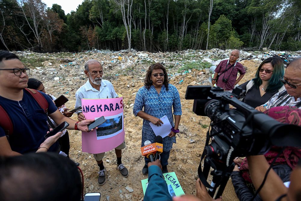 Sahabat Alam Malaysia research officer S. Mageswary (centre) says the remaining mangrove forest in Batu Maung must be preserved and protected for the future generation. u00e2u20acu2022 Picture by Sayuti Zainudin