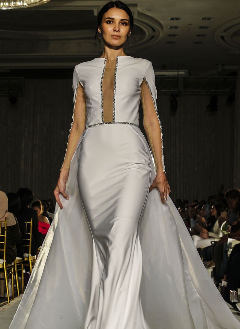 With sleek and elegant details, this gown is bound to take your breath away.