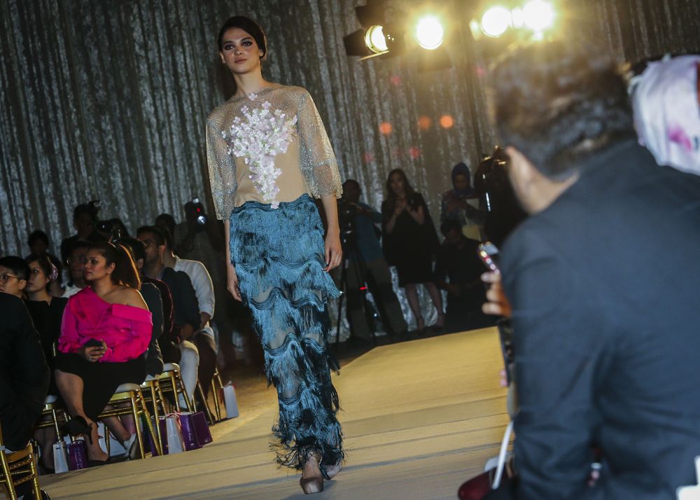 For the bride who loves standing out, this colourful dress is sure to hit the right note.