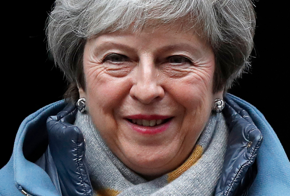 British Prime Minister Theresa May leaves 10 Downing Street to make a statement to the House of Commons in London on January 21, 2019, on changes to her Brexit withdrawal agreement. u00e2u20acu201d AFP pic 
