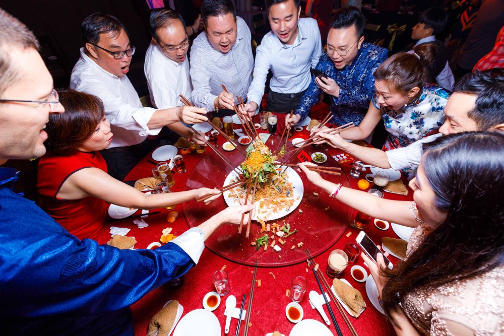 The traditional prosperity toss was not forgotten of course. — Picture courtesy of Heineken Malaysia 