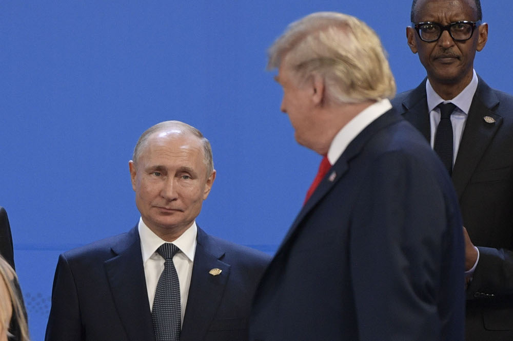 In this file photo taken on November 30, 2018 US President Donald Trump, looks at Russiau00e2u20acu2122s President Vladimir Putin before a photo call during the G20 Leadersu00e2u20acu2122 Summit in Buenos Aires.u00e2u20acu201d AFP pic 