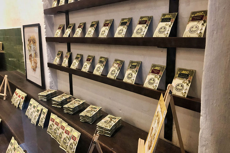 Bar display at Seniman Kakao Café, including their locally made vegan chocolate bars.