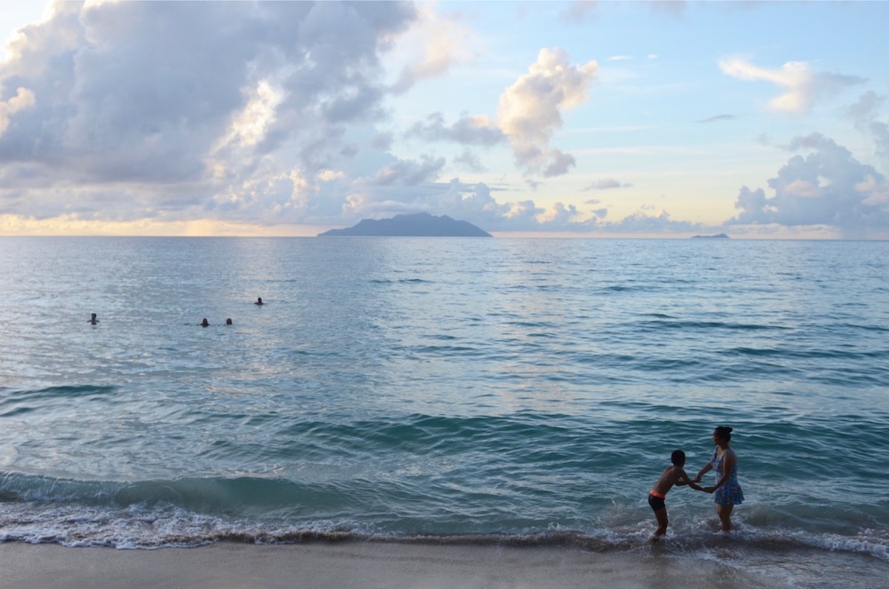 A handout picture taken and released by the Nature Conservacy agency shows tourists enjoying the beach and the sea in Mahe, in the Seychelles island February 19, 2018. u00e2u20acu201d AFP pic