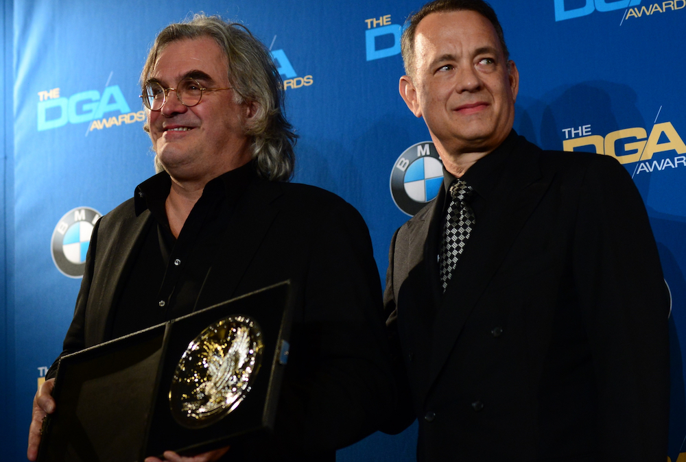 Paul Greengrass with Tom Hanks after winning Outstanding Directorial Achievement in Feature Film for 'Captain Phillips' at the 2014 Directors Guild Awards. u00e2u20acu201d AFP pic