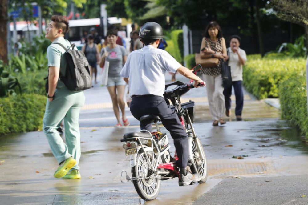 Cyclists and users of personal mobility devices in Singapore will be subjected to new rules that kick in from today. u00e2u20acu201d TODAY file pic