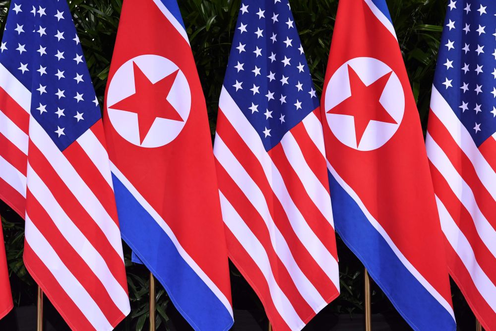 North Korean and US flags stand side by side at the location where North Koreau00e2u20acu2122s leader Kim Jong-un met with US President Donald Trump for a US-North Korea summit, at the Capella Hotel on Sentosa island in Singapore, June 12, 2018. u00e2u20acu201d AFP pic