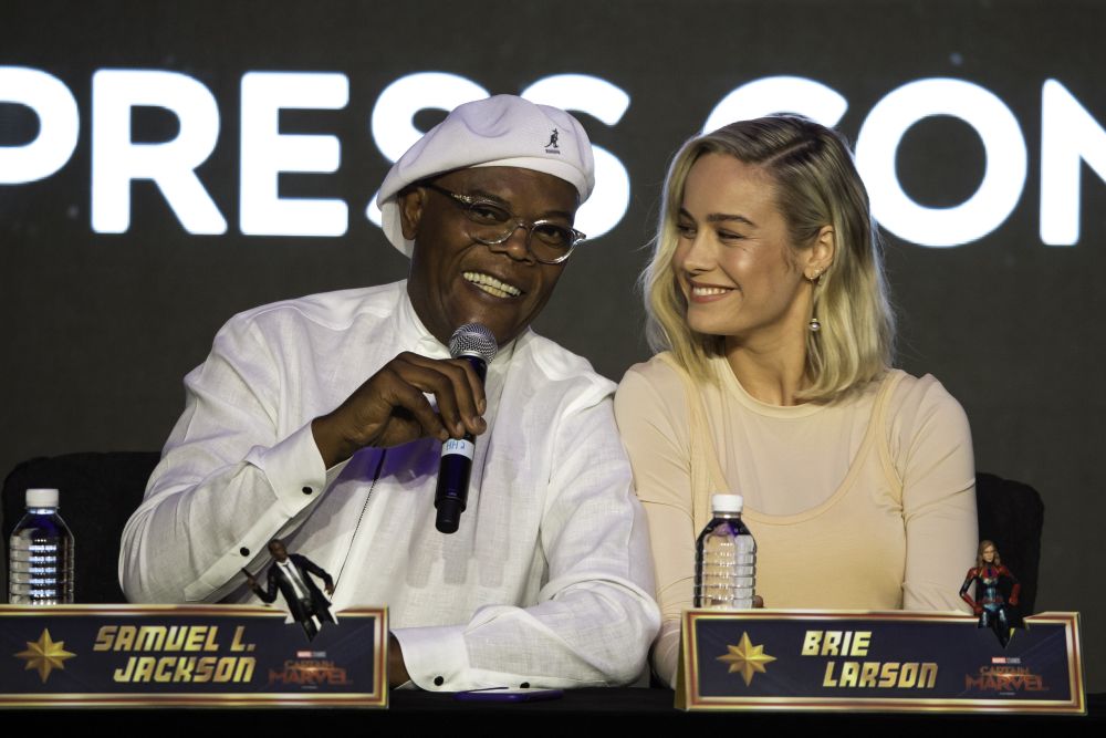 Jackson and Larson sharing a light moment during the press conference.