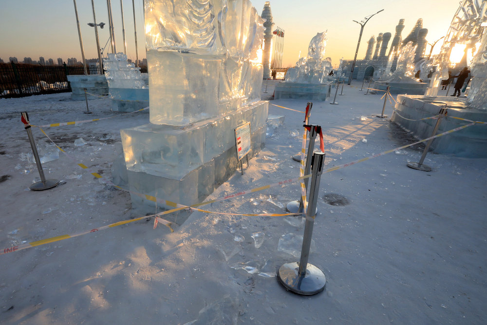 Security lines are seen set up for protecting visitors from falling ice from melting ice sculptures at the venue of the Harbin International Ice and Snow Sculpture Festival on its closing day, February 17, 2019. u00e2u20acu201d Handout via Reuters