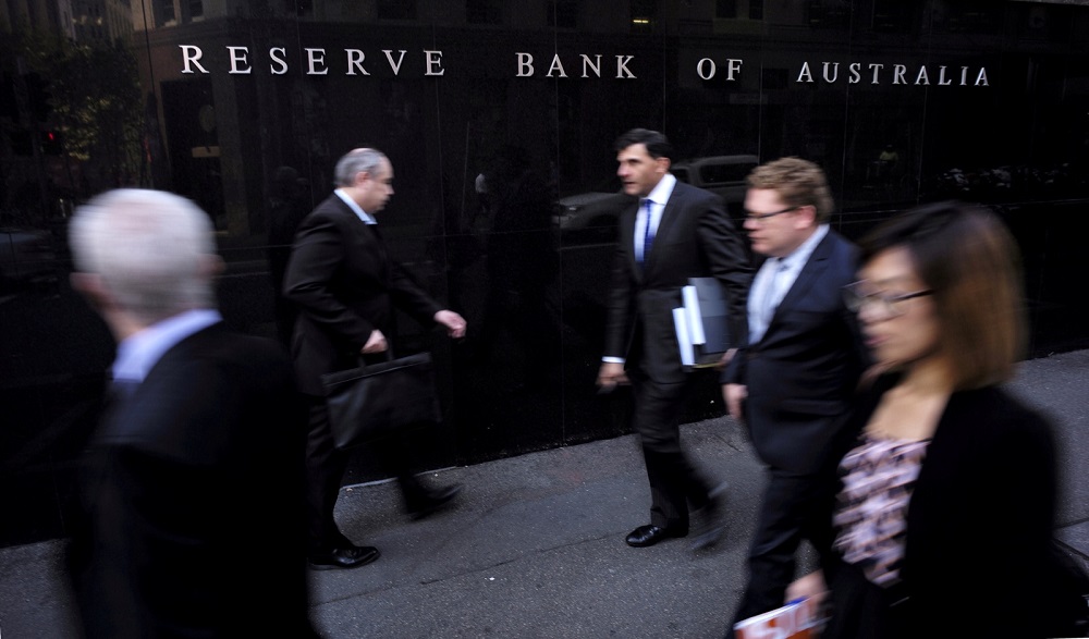 Business people walk outside the Reserve Bank of Australia in Sydney May 5, 2015.  u00e2u20acu201d Reuters pic