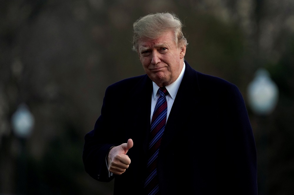 US President Donald Trump thumbs up as he returns to the White House in Washington, US, after an annual physical test at the Walter Reed National Military Medical Centre in Bethesda, Maryland February 8, 2019. u00e2u20acu201d Reuters pic
