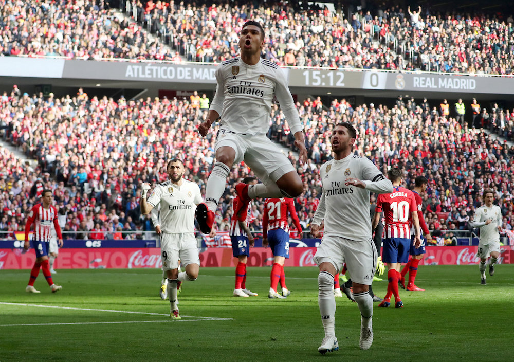 Real Madridu00e2u20acu2122s Casemiro celebrates scoring their first goal with Sergio Ramos during their La Liga match with Atletico Madrid at Wanda Metropolitano in Madrid February 9, 2019. u00e2u20acu201d Reuters pic
