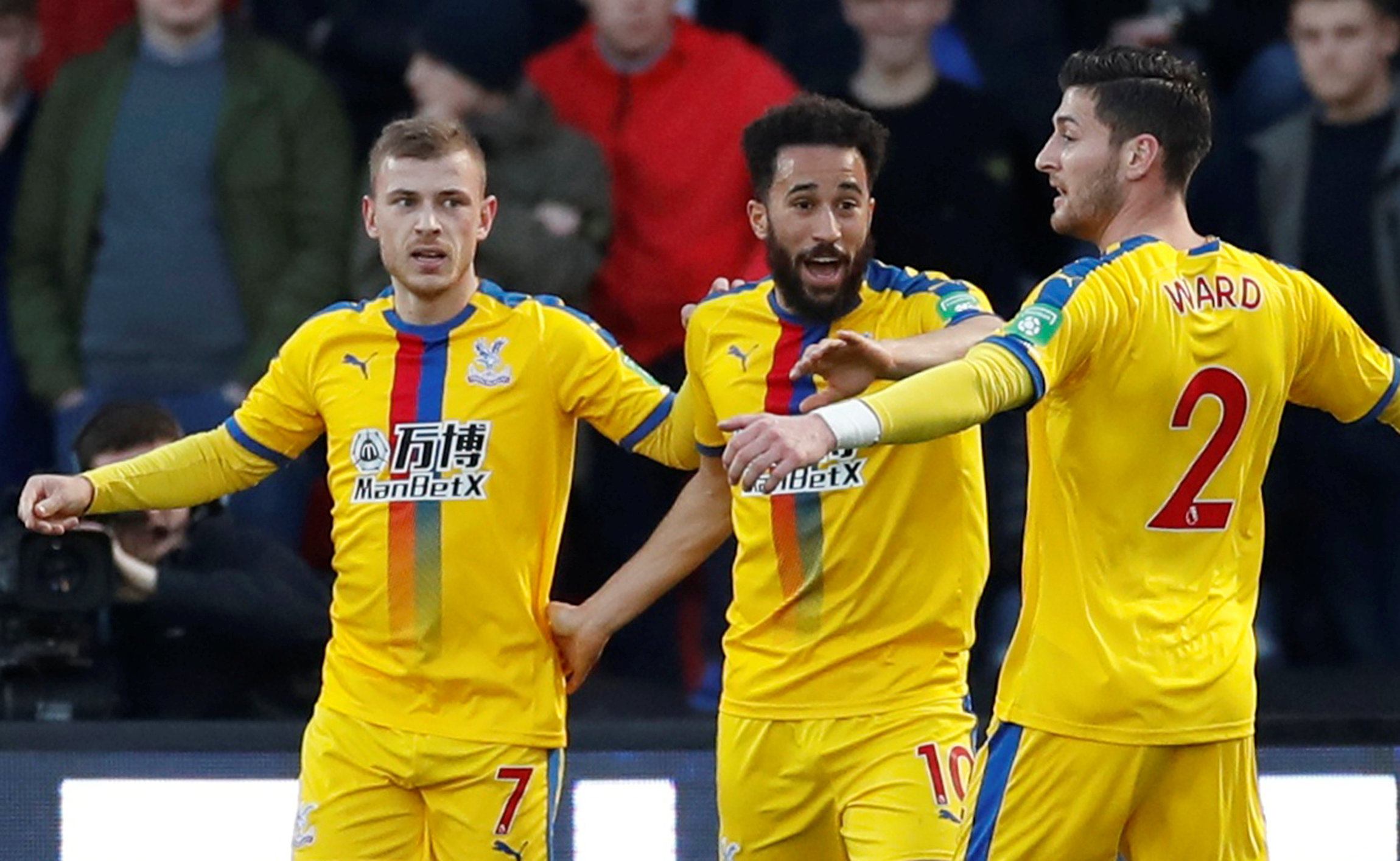 Crystal Palaceu00e2u20acu2122s Max Meyer celebrates scoring their second goal with Andros Townsend and Joel Ward at the Keepmoat Stadium in Doncaster February 17, 2019. u00e2u20acu201d Action Images via Reuters
