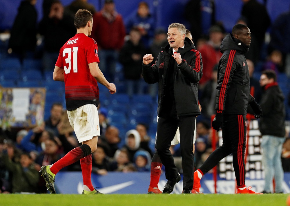 Manchester United interim manager Ole Gunnar Solskjaer celebrates with Nemanja Matic at the end of the match against Chelsea at Stamford Bridge in London February 18, 2019. u00e2u20acu201d Action Images via Reuters