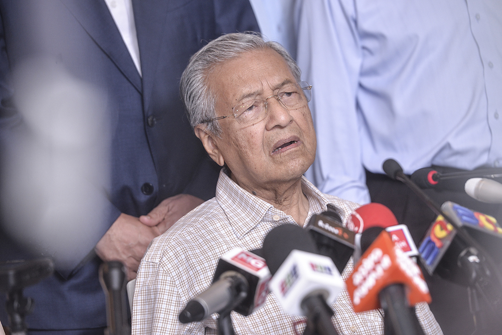 Tun Dr Mahathir Mohamad speaks to reporters after chairing the Pakatan Harapan presidential council meeting in Putrajaya February 1, 2019. u00e2u20acu201d Picture by Shafwan Zaidon