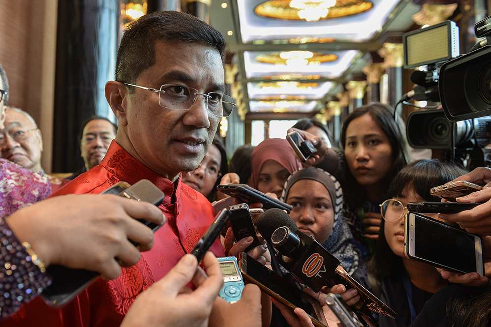 Economic Affairs Minister Datuk Seri Mohamed Azmin Ali speaks to reporters after attending a Chinese New Year celebration at Sunway Resort Hotel and Spa in Petaling Jaya February 12, 2019. u00e2u20acu201d Picture by Miera Zulyana