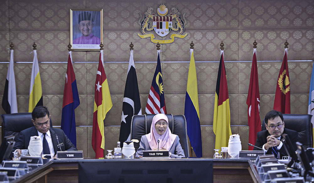 (From left) Datuk Seri Saifuddin Nasution Ismail, Datuk Seri Dr Wan Azizah Wan Ismail and Chong Chieng Jen attend a meeting in Putrajaya February 15, 2019. u00e2u20acu201d Picture by Shafwan Zaidon