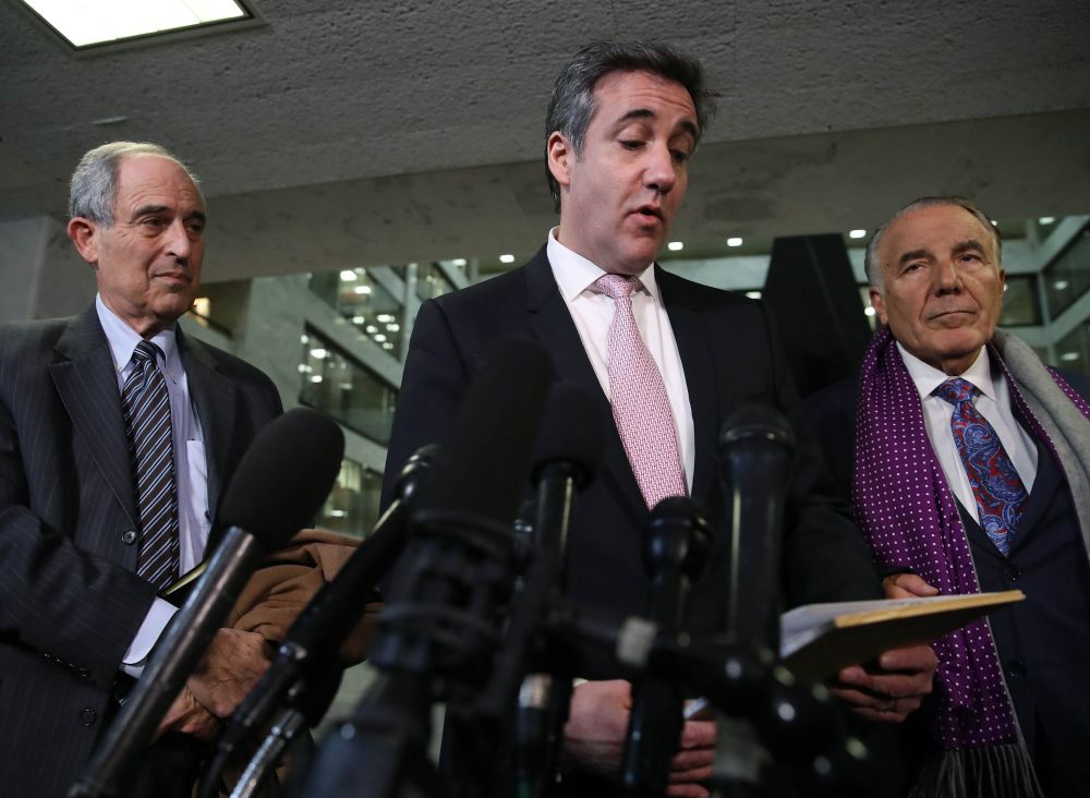 Michael Cohen (centre) reads a statement to the media at the Hart Senate Office Building after testifying to the Senate Intelligence Committee on Capitol Hill February 26, 2019 in Washington, DC. u00e2u20acu201d Mark Wilson/Getty Images pic via AFP
