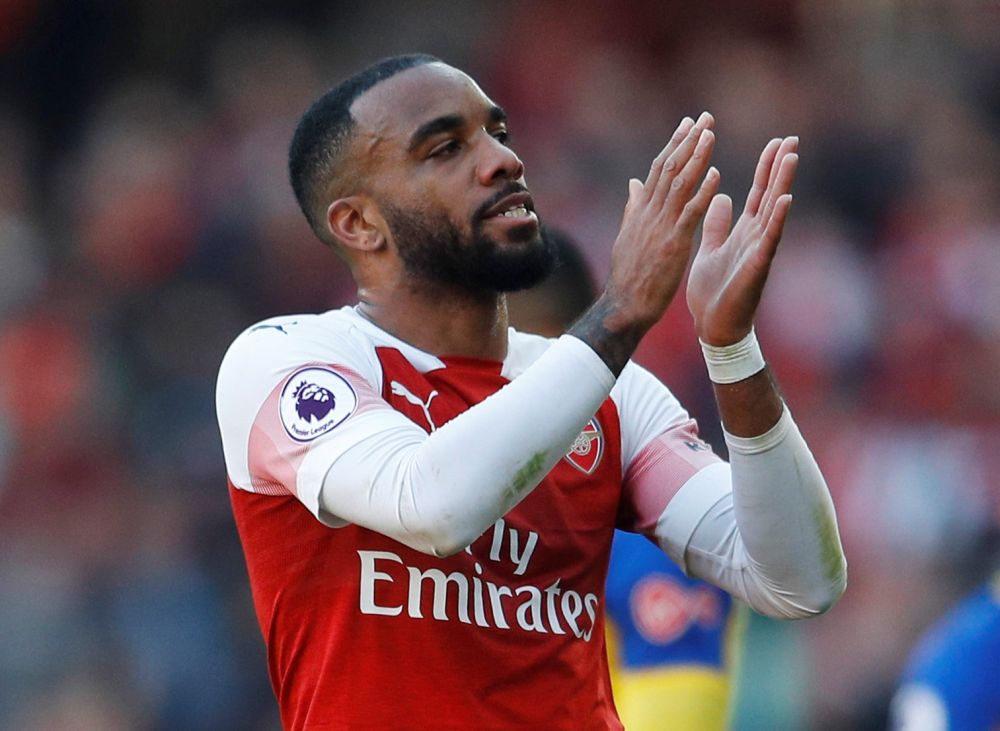 The video circulated online showed French striker Alexandre Lacazette, 28, appearing to inhale from the balloon and sitting back as his eyes close. ― Reuters pic