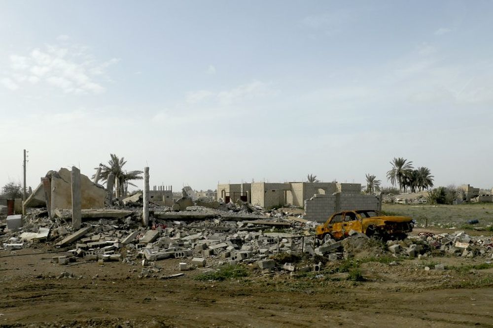 This picture shows trees and destructions during an operation to expel Islamic State group (IS) jihadists from their last bastion, in Baghouz in the eastern Syrian province of Deir Ezzor, February 16, 2019. u00e2u20acu201d AFP pic