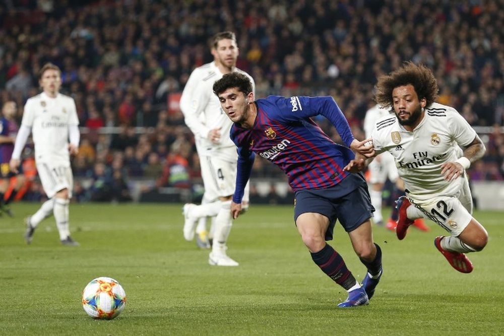 Barcelonau00e2u20acu2122s Carles Alena (centre) vies for the ball with Real Madridu00e2u20acu2122s Marcelo during their Spanish Copa del Rey (Kingu00e2u20acu2122s Cup) semi-final first leg match at the Camp Nou stadium in Barcelona, February 6, 2019. u00e2u20acu201d AFP pic