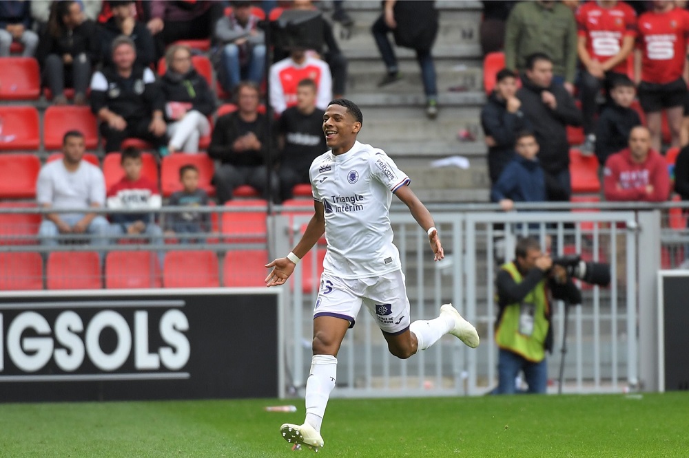 Toulouseu00e2u20acu2122s French defender Jean-Clair Todibo celebrates after scoring a goal during the French L1 football match against Rennes at the Roazhon Park stadium in Rennes September 30, 2018. u00e2u20acu201d AFP