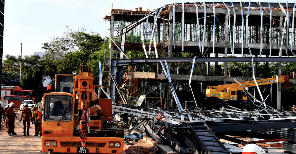 Fire and Rescue personnel are seen at the scene of a factory collapse in Bukit Mertajam February 15, 2019. u00e2u20acu201d Bernama pic