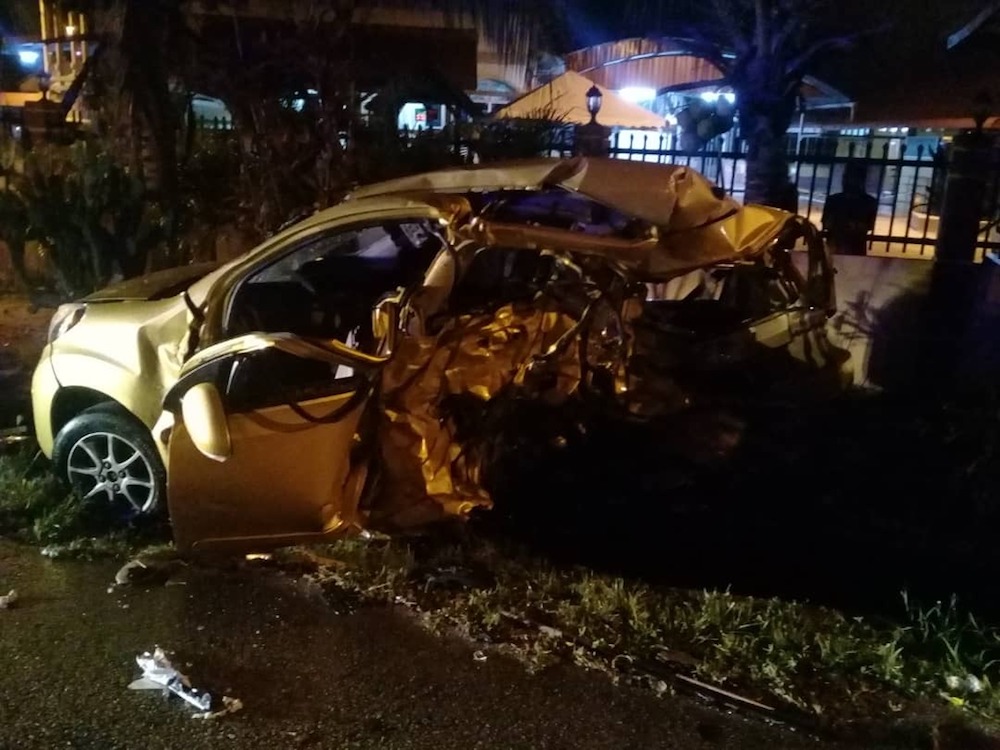 B. Maheshwara Rao and M. Shasissegar were killed when their Myvi was involved in a head-on collision with a Toyota Hilux. u00e2u20acu201d Picture courtesy of the Fire and Rescue Department
