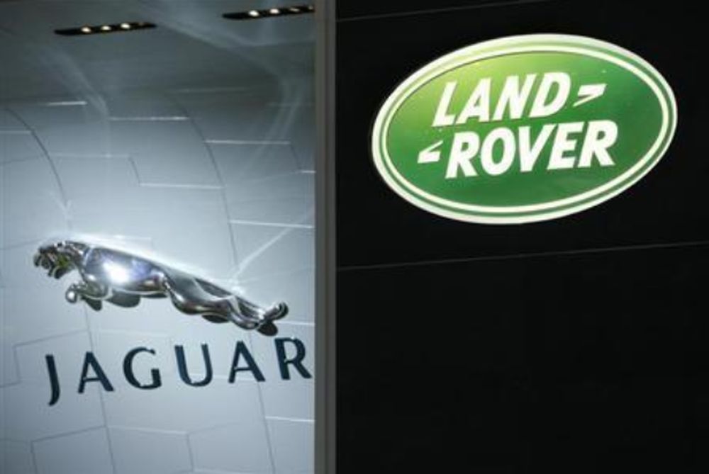 Logos of the carmakers Jaguar and Land Rover are pictured during the first media day of the 78th Geneva Car Show at the Palexpo in Geneva March 4, 2008. u00e2u20acu201d Reuters pic