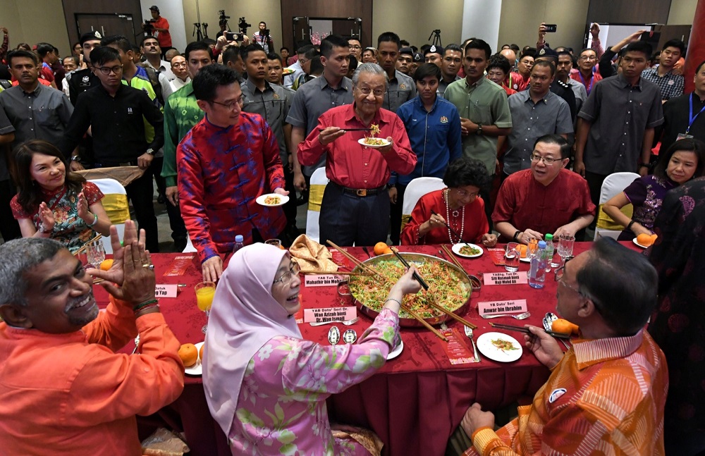 Prime Minister Tun Dr Mahathir Mohamad, his wife Tun Dr Siti Hasmah Mohamad Ali and several other Cabinet ministers at the open house hosted by Finance Minister Lim Guan Eng and NCCIM in Kuala Lumpur February 6, 2019. u00e2u20acu201d Bernama pic