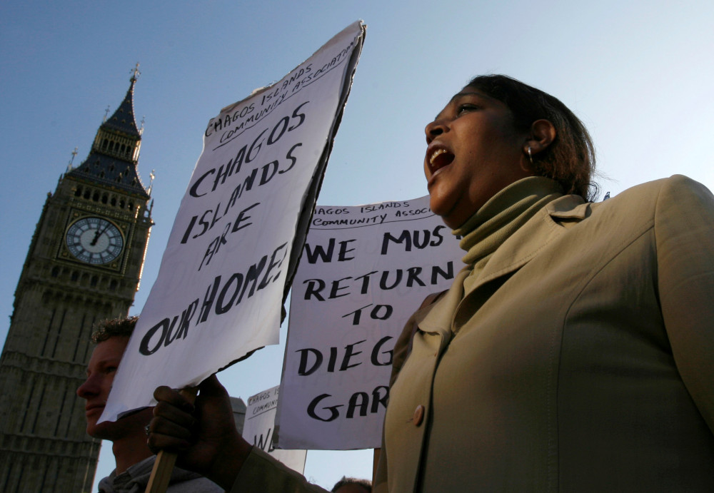 A demonstrator demanding her return to the Chagos Islands in the Diego Garcia archipelago shouts during a protest outside the Houses of Parliament in London October 22, 2008. u00e2u20acu201d Reuters pic