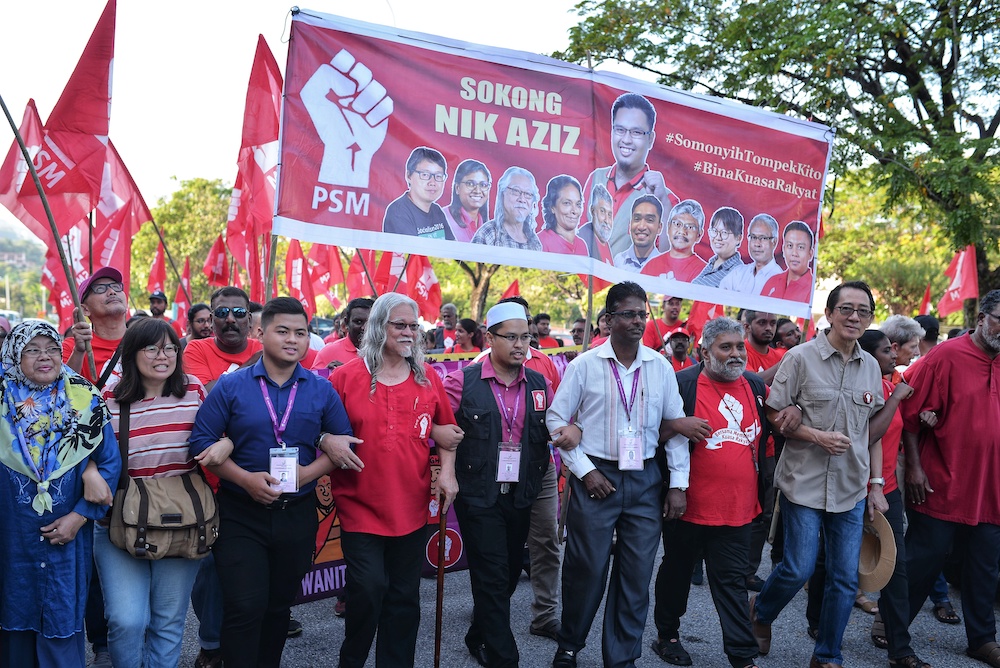 Parti Sosialis Malaysia (PSM) president, Nasir Hashim and PSM candidate, Nik Aziz Hafiq arrive at  the Semenyih by-election nomination centre in Dewan Seri Cempaka, Saujana Impian, February 16, 2019 u00e2u20acu201d Picture by Shafwan Zaidon