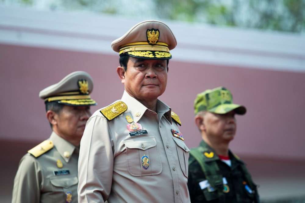 Thai Prime Minister Prayut Chan-O-Cha (centre) witnesses a disaster management training exercise standing next to army Commander in Chief Apirat Kongsompong (right) at a military base in Lopburi, February 14, 2019. u00e2u20acu201d AFP pic