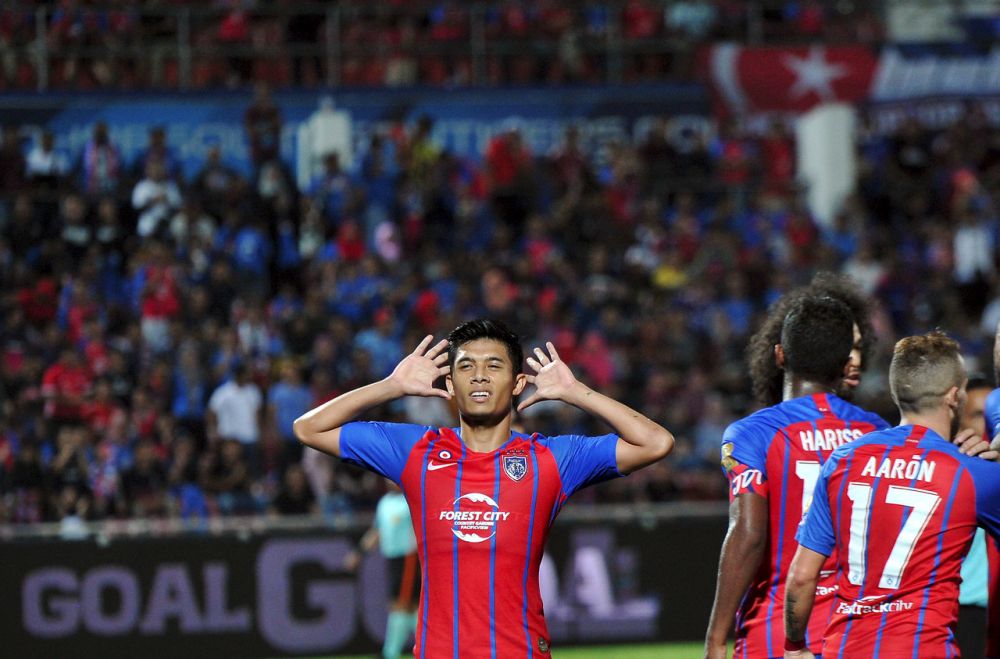 Pemain JDT Syafiq Ahmad meraikan kemenangan selepas berjaya menjaringkan gol kedua di Stadium Tan Sri Dato' Haji Hassan Yunos, malam tadi. u00e2u20acu201d Foto Bernama