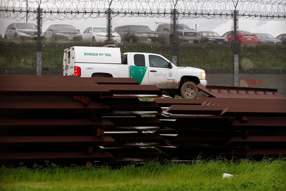 A US border patrol vehicle drives past metal sections to be used to fix the border fence between Mexico and the US, as seen from Tijuana, Mexico, February 14, 2019. u00e2u20acu201d Reuters pic
